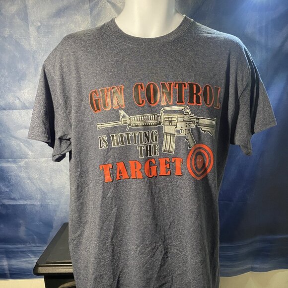 New Gun Control Is Hitting The Target Adult Unisex Dark Gray Tee Shirt - Picture 1 of 4